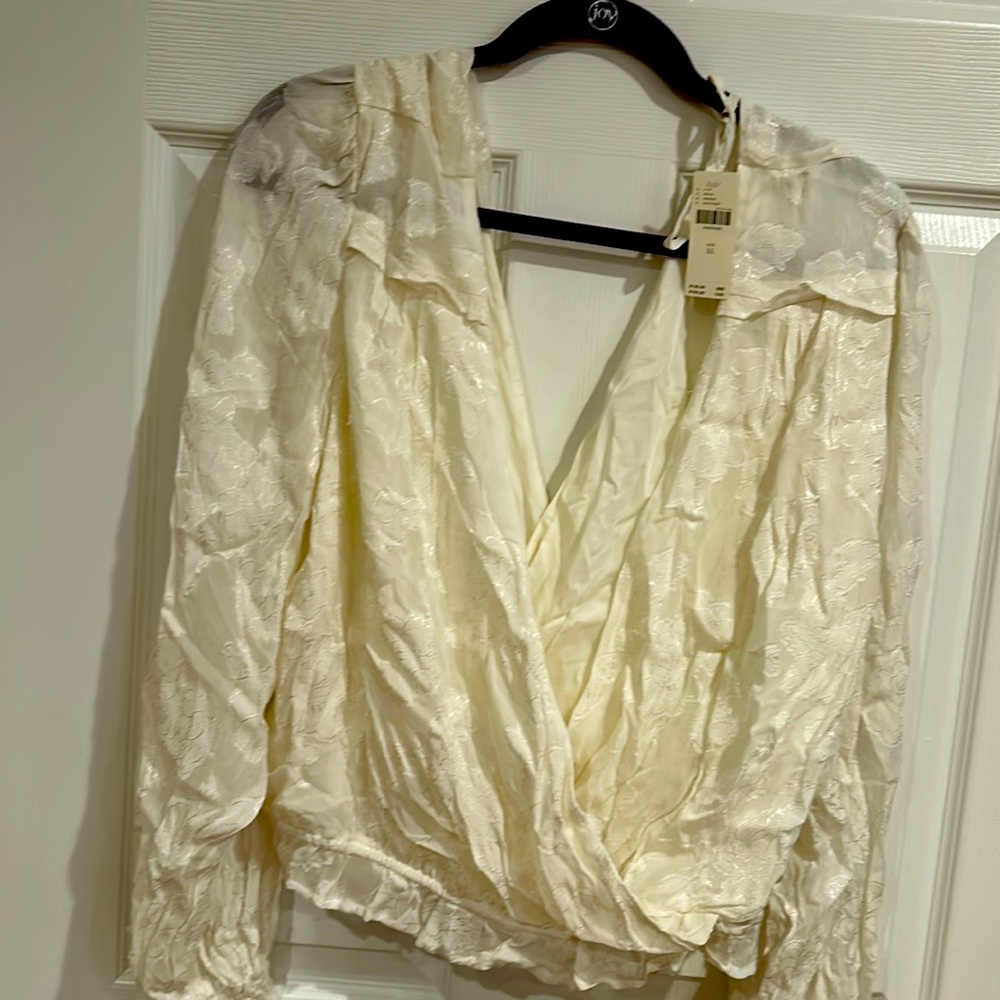 Cream colored v neck front and back blouse. Anthropologie,NWT. Size xl